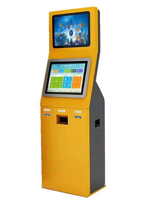 Samoobsługowy kiosk z dwoma ekranami, w którym można płacić rachunki za ubezpieczenie podatkowe